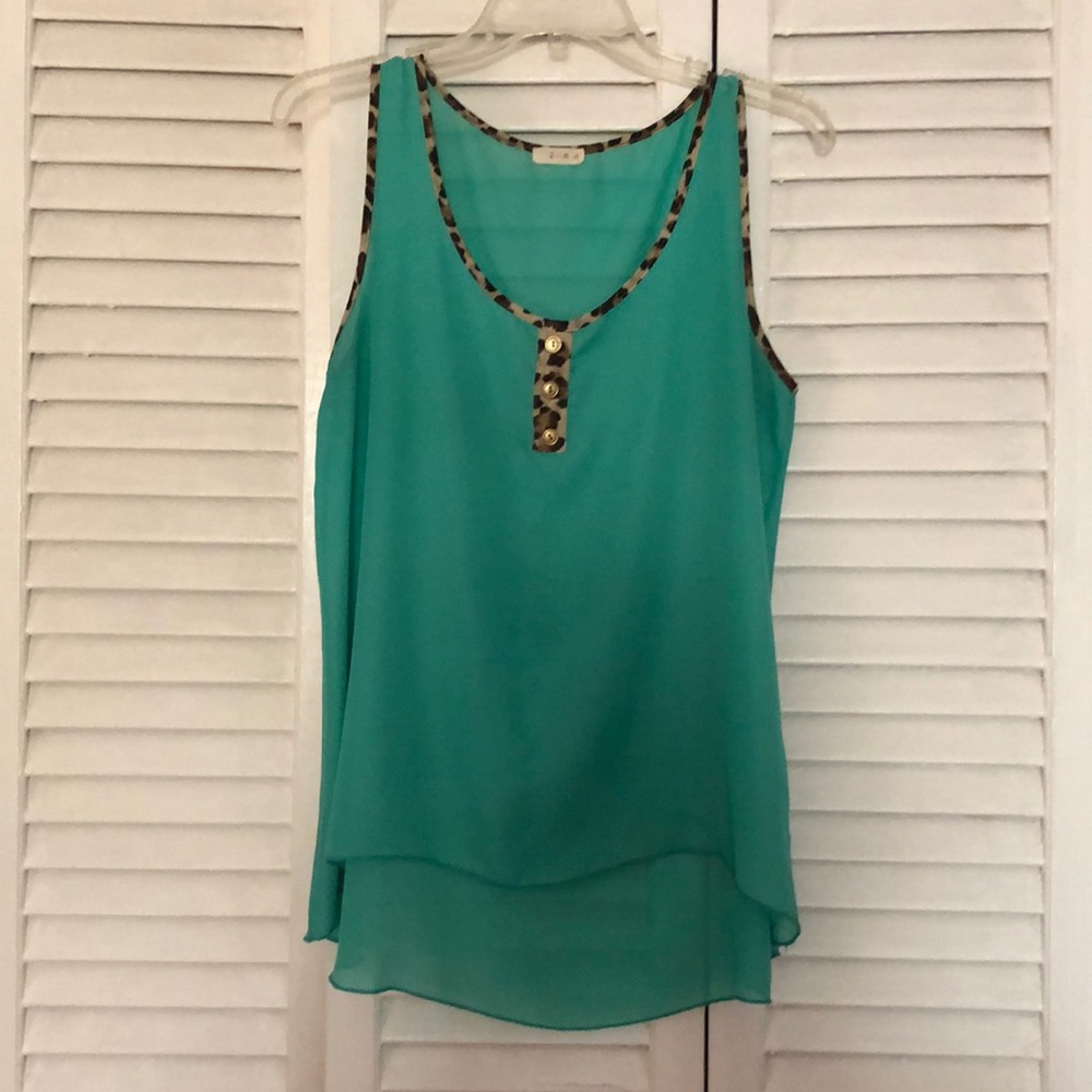 Women’s chiffon top with leopard detail